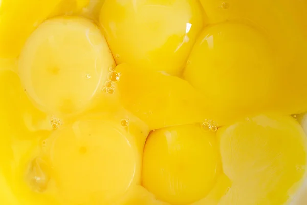 Food background with egg yolks — Stock Photo, Image