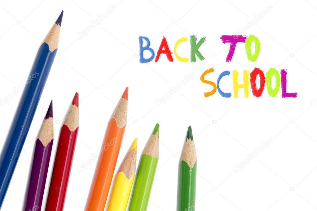 colored pencils isolated on white and text back to school