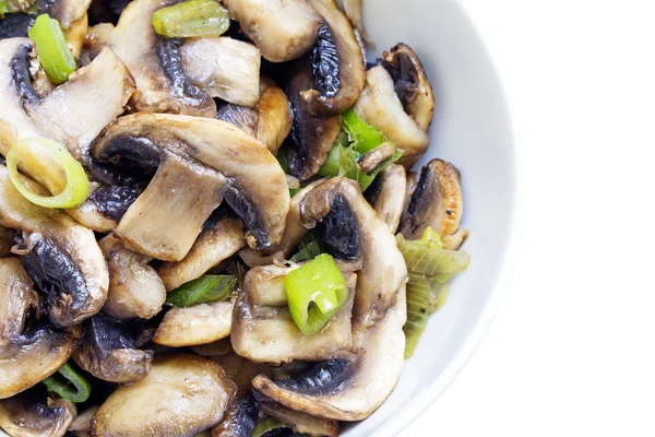 Mushroom vegetable dish in a bowl on a white background — Stock Image Mushroom vegetable dish in a bowl on a white background Stock Picture