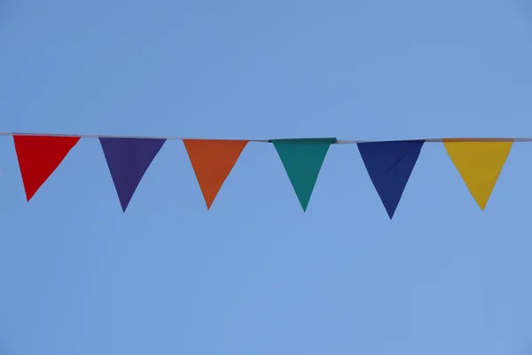 Vlag tegen een blauwe hemel — Stockfoto