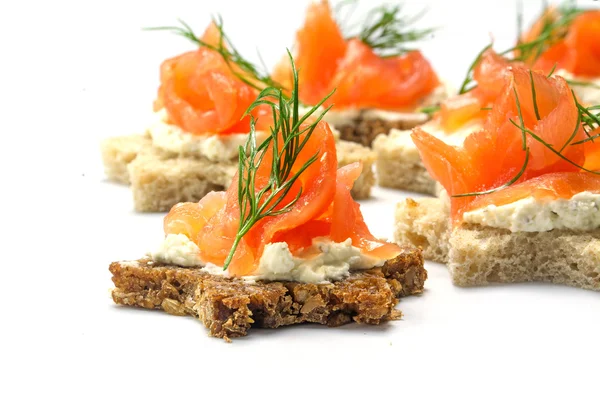 Canapes in star shape with salmon for Christmas or New Year, on — Stock Photo, Image
