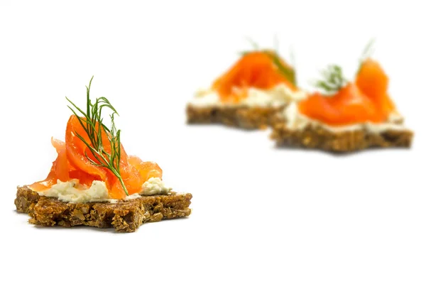 Canapes  in star shape with smoked salmon for a christmas dinner — Stock Photo, Image