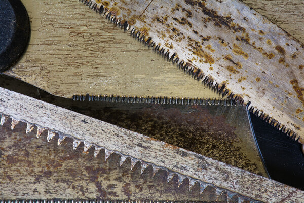 Background texture, old rusty saw blades, carpentry concept