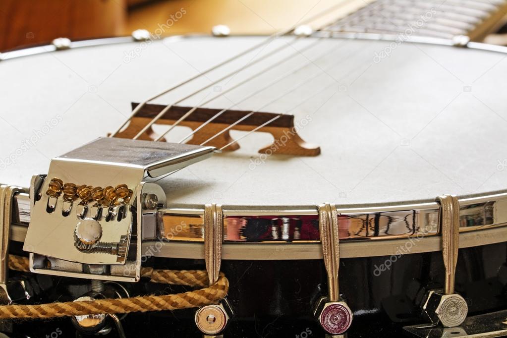 metallic banjo with 6 strings, music instrument detail 