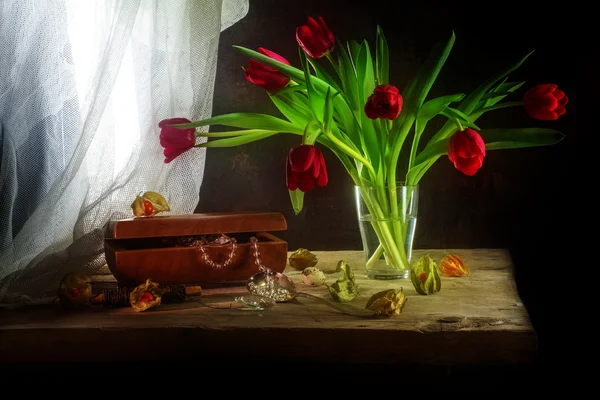 Red tulips, jewelery box, some physalis and white curtain, still life in painting style — Stock Photo, Image