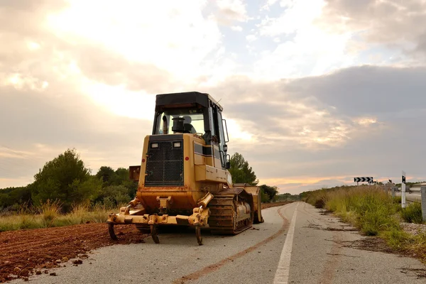 Bulldozer máquina de construção de estradas — Fotografia de Stock