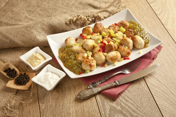 Chicken Meatball On wooden table with relish, mustard and mayonnaise — Zdjęcie stockowe