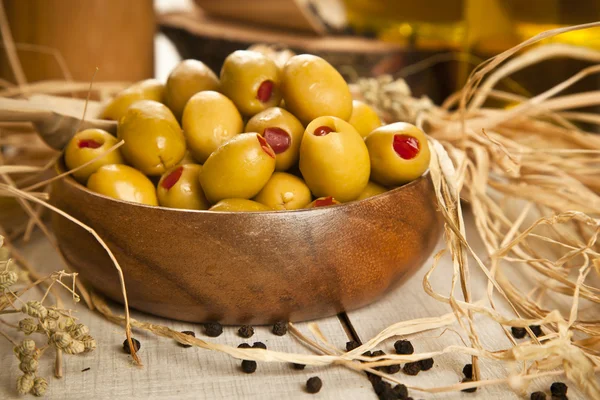 Green olives with olive oil — Stock Photo, Image