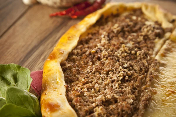 Delicious heart shaped meat and cheese Turkish pizza pide — Stock Photo, Image