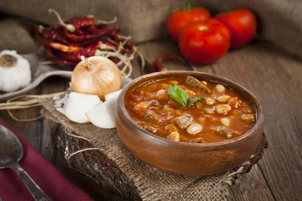 Hot turkish bean stew with a tasty tomato sauce. — Stock Image Hot turkish bean stew with a tasty tomato sauce. Stock Photo
