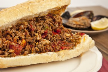 Turkish Kokorec - lamb intestine food sandwich with midye dolma clipart