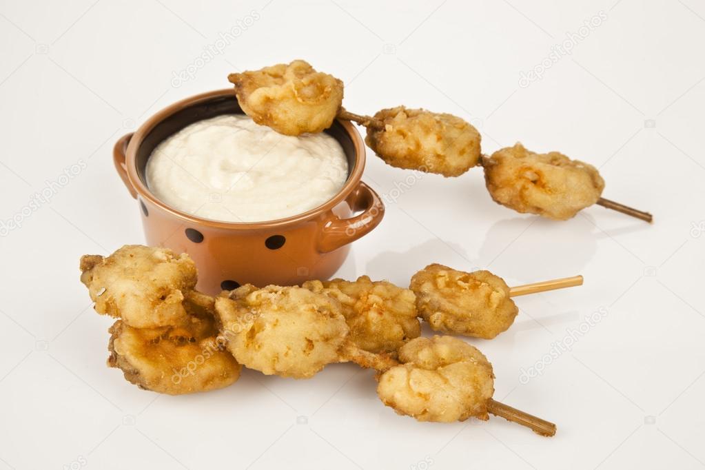 Turkish chop Fried mussels - Midye Tava with white background