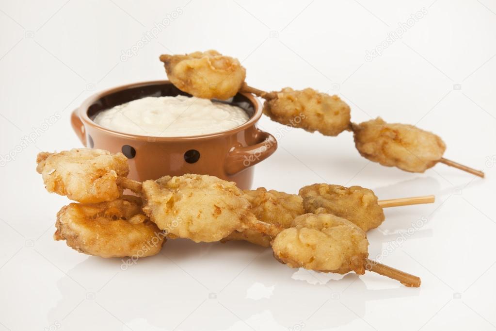 Turkish chop Fried mussels - Midye Tava with white background