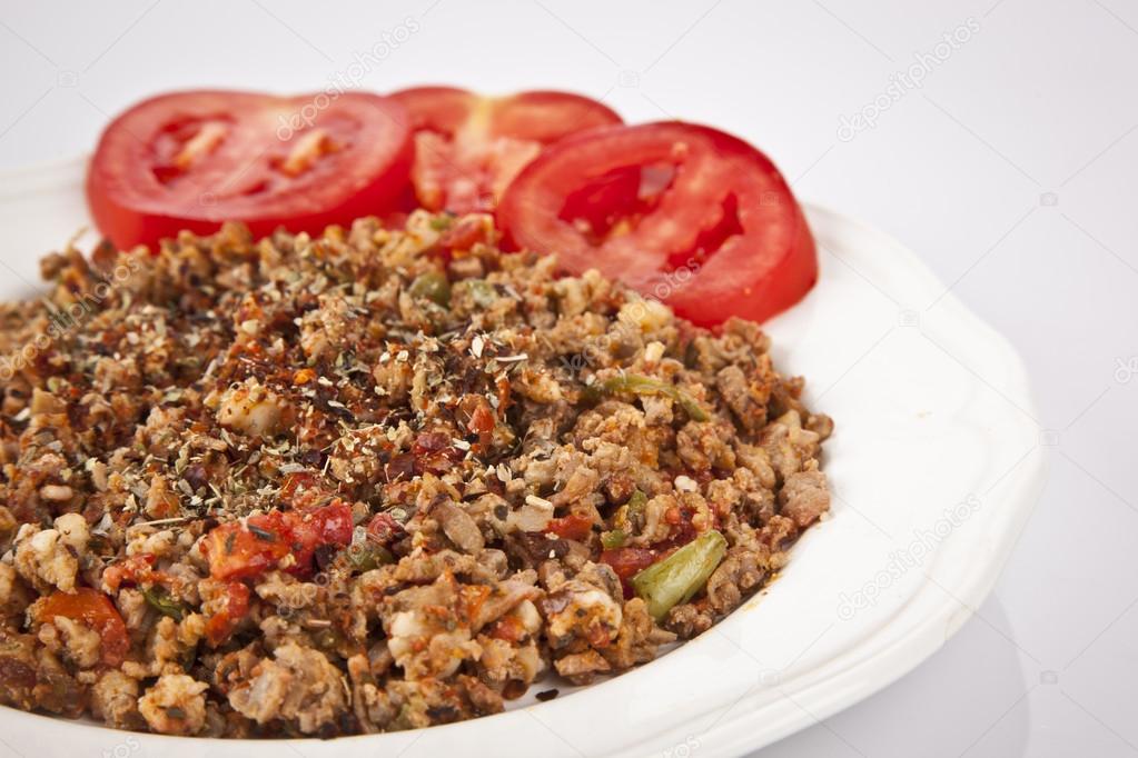Turkish Kokorec - lamb intestine food portion with white background