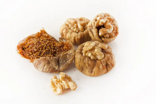 Dried figs with walnuts isolated white background — Stock Photo, Image