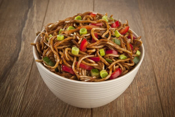 Bowl of noodles with vegetables — Stock Photo, Image