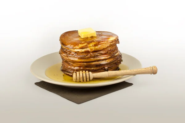 Stack of pancakes with butter — Stock Photo, Image