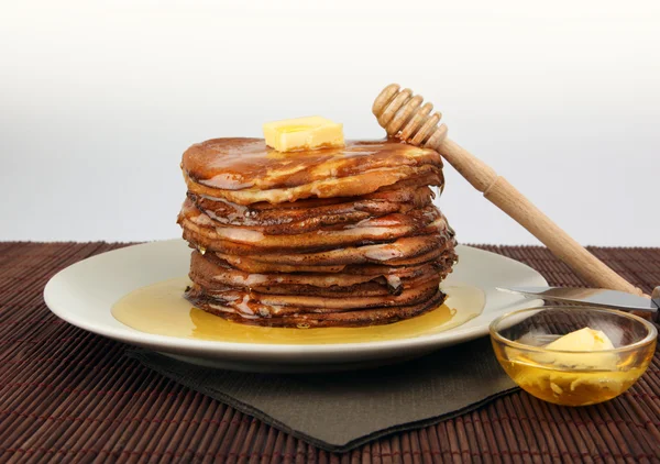 Stack of pancakes with butter — Stock Photo, Image