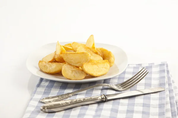 Fried potato wedges isolated — Stock Photo, Image