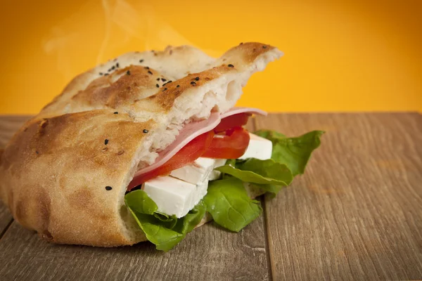 Cheese sandwich with tomato, cucumber and salad — Stock Photo, Image