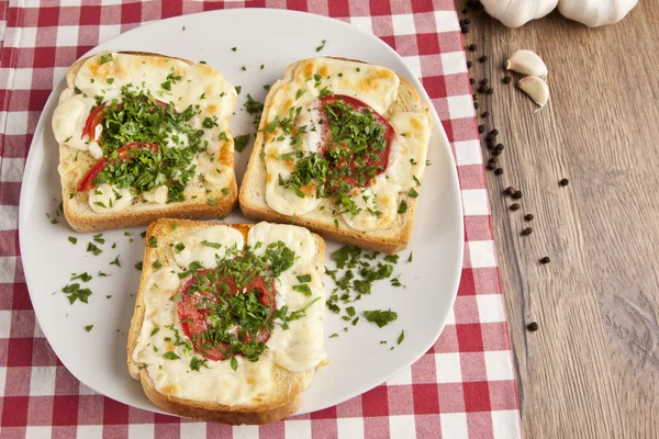 Toasted Cheese and Garlic Bread with Parsley — Stock Image Toasted Cheese and Garlic Bread with Parsley Stock Photo