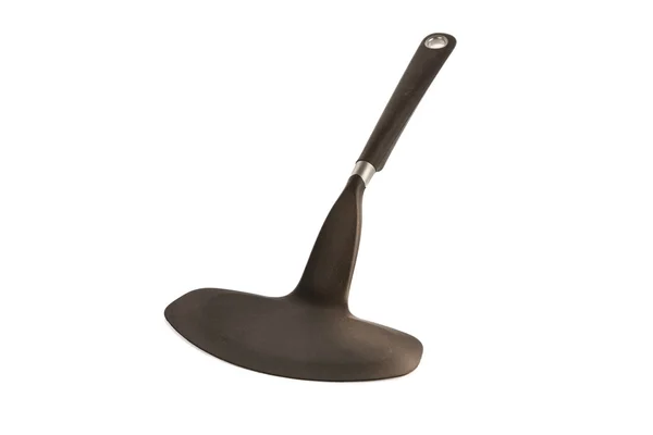 Black plastic kitchen spatula isolated on white — Stock Photo, Image