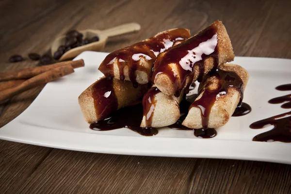 Cinnamon Dessert with Chocolate sauce — Stock Photo, Image