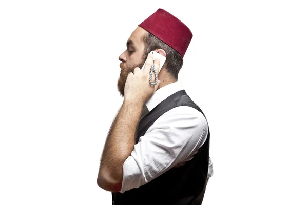 Man in traditional turkish hat and dress kabadayi talking phone — Stock Photo, Image