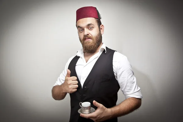 Man in traditional turkish hat and dress kabadayi drinking turkish coffee — Stock Photo, Image