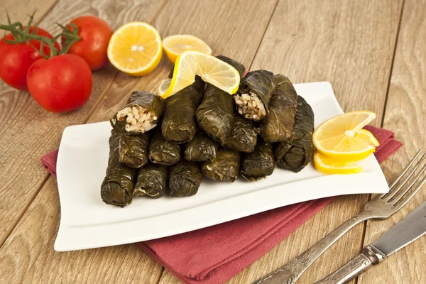 Wrap stuffed with olive oil Ottoman, Turkish and Greek cuisine, the most beautiful appetizer. — Stock Photo, Image