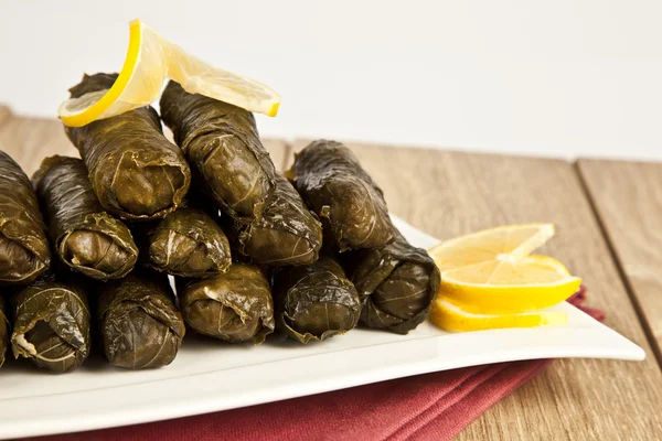 Wrap stuffed with olive oil Ottoman, Turkish and Greek cuisine, the most beautiful appetizer. — Stock Photo, Image