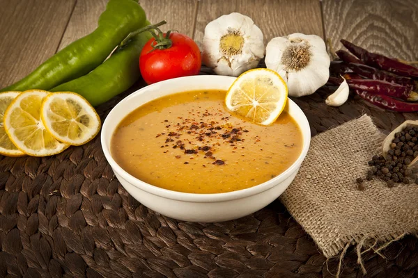 Lentil cream soup with lemon slices — Stock Image Lentil cream soup with lemon slices Stock Picture