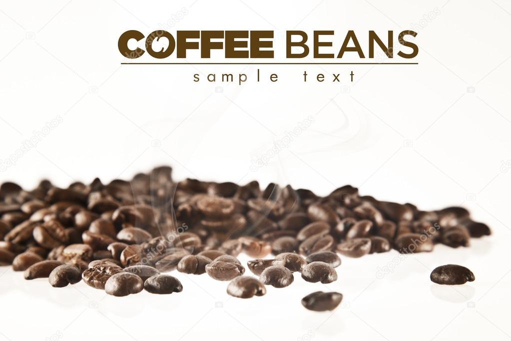 Brown coffee beans isolated on white background