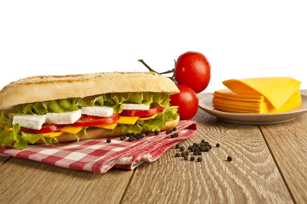 Different kind of cheese sandwich and tomatoes with concept background — Stock Photo, Image