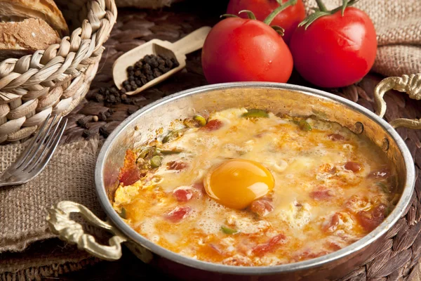 Menemen Turkish breakfast food egg, tomatoes and pepper in pan — Stock Photo, Image