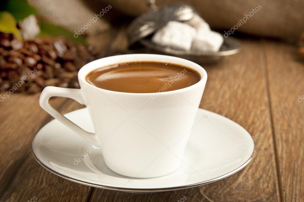 Traditional Turkish Coffee cup and coffee beans concept