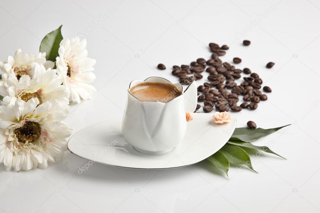 Traditional Turkish Coffee cup and beans concept tulip cup