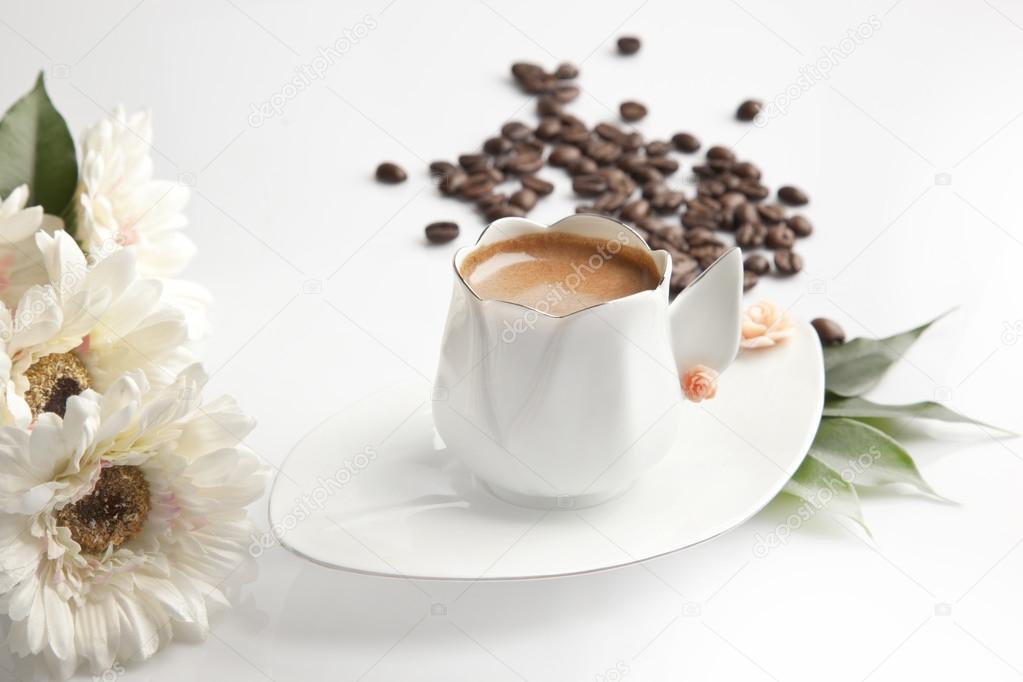 Traditional Turkish Coffee cup and beans concept tulip cup