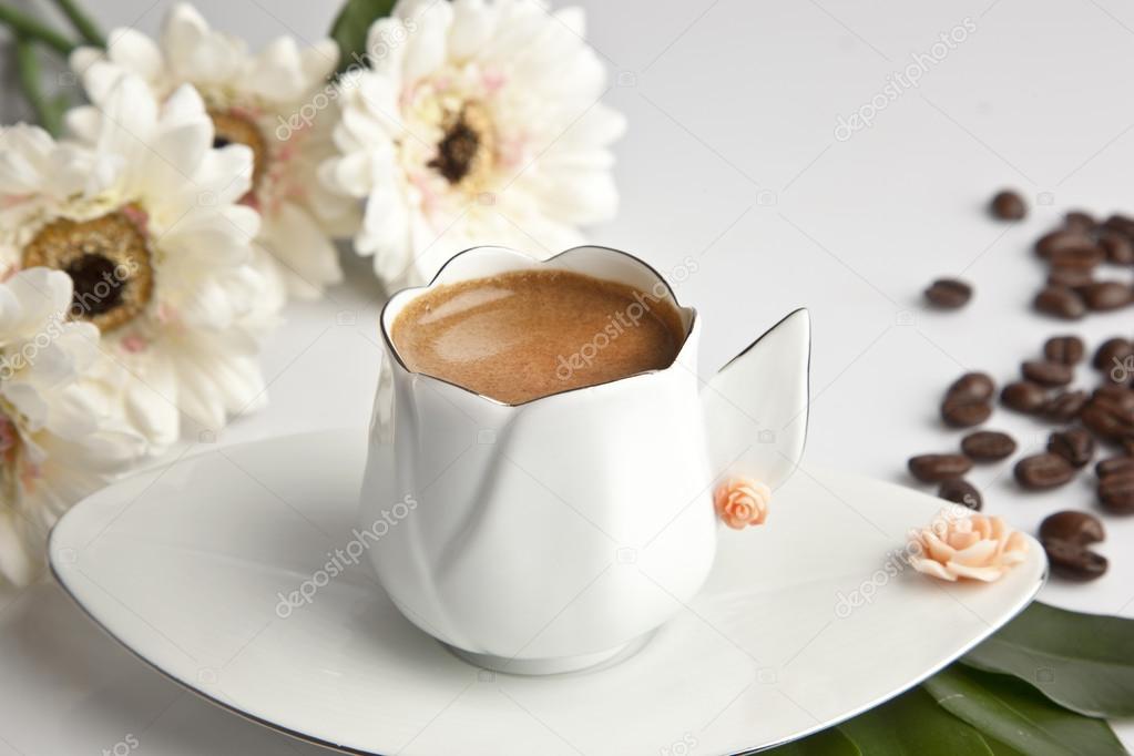 Traditional Turkish Coffee cup and beans concept tulip cup