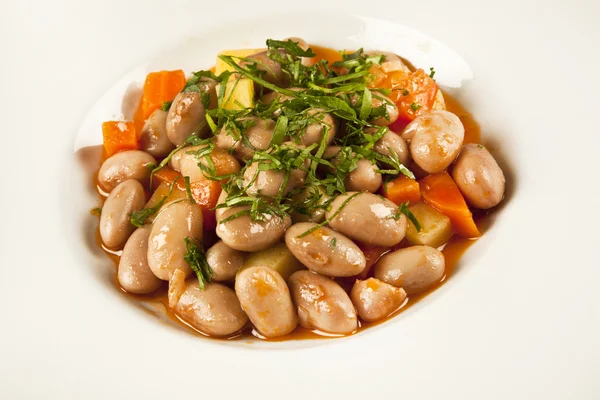 Bean Stew Turkish Barbunya Pilaki with concept background — Stock Image Bean Stew Turkish Barbunya Pilaki with concept background Royalty Free Stock Images