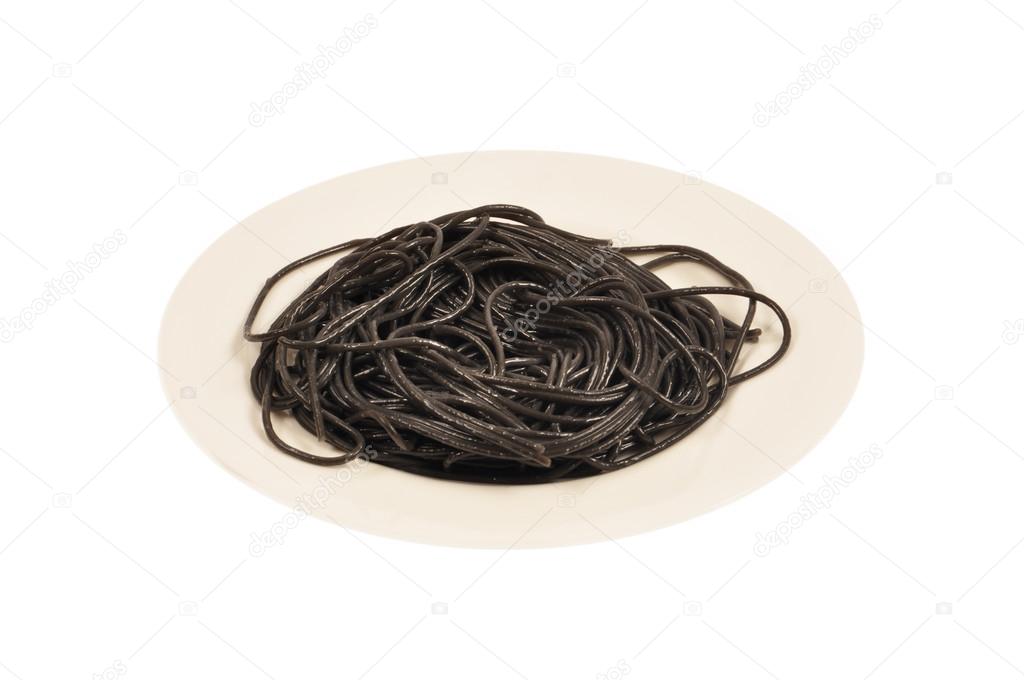 Squid ink homemade pasta on marble board