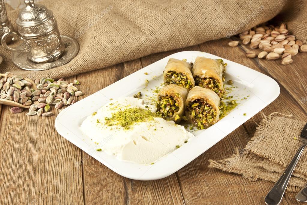 Turkish Ramadan Dessert Baklava kadayif with ice cream concept background