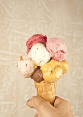 Mixed ice cream scoops with cone clipart