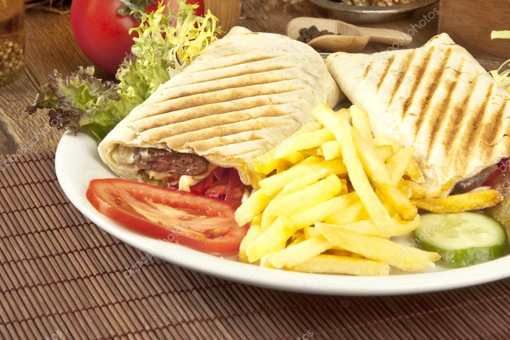 Turkish Shawarma durum Traditional chicken and meat sish kebab wrap
