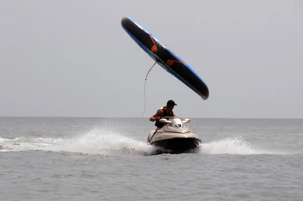 Sea sky wet bike attraction walk sports rest competition slings air entertainment drive movement positive — Stock Photo, Image