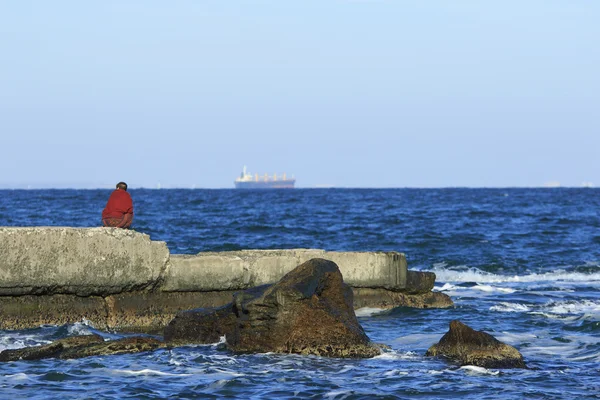 Lonely woman at sea — Stock Photo, Image