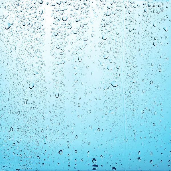 Texture drops of water on the transparent glass background — Stock Photo, Image