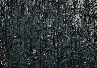 Siyah akış boyalı, sanat arkaplanı olan koyu renkli duvarı kapat.