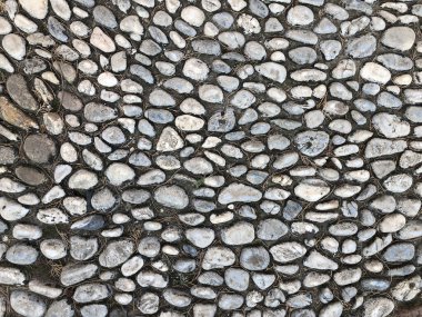 Gri küçük çakıl taşını kapat, taşlar kaldırım taşı gibi.