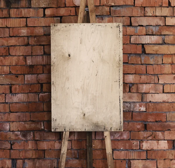 Staffelei Kunst Hintergrund, Ziegelwand — Stockfoto